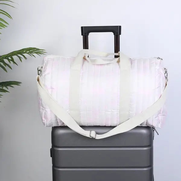 Sac voyage pour parents blanc motif bleu ou rose