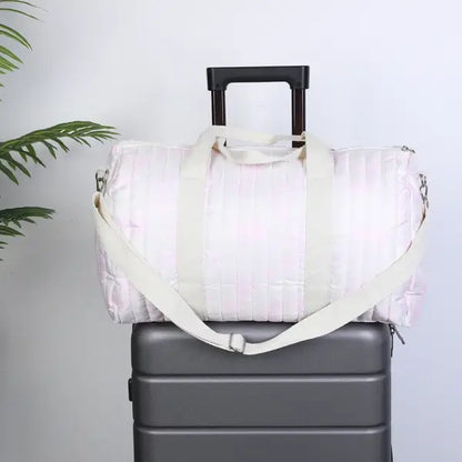 Sac voyage pour parents blanc motif bleu ou rose