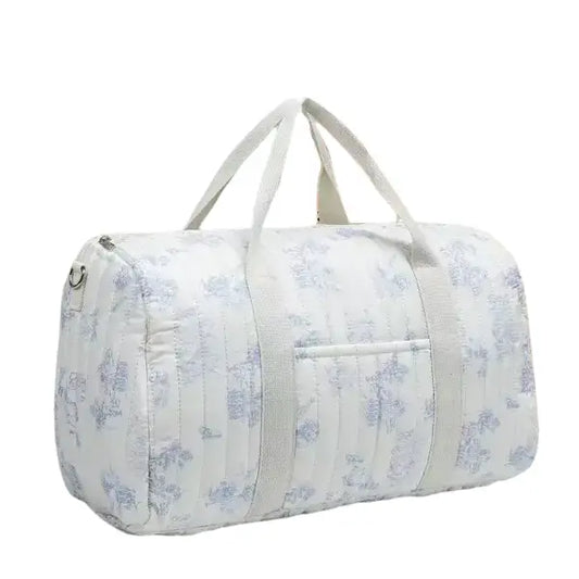 Sac voyage pour parents blanc motif bleu ou rose